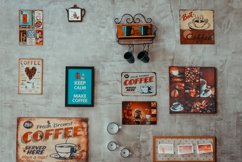 assorted-color coffee and quote wall decors on wall
