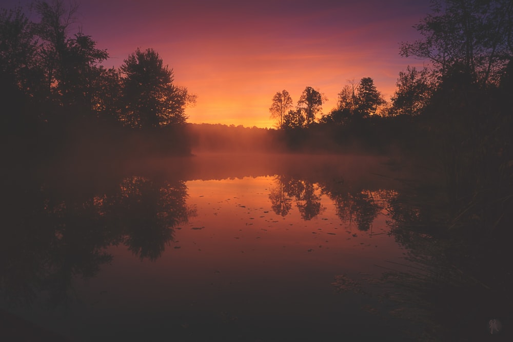 body of water during golden hour