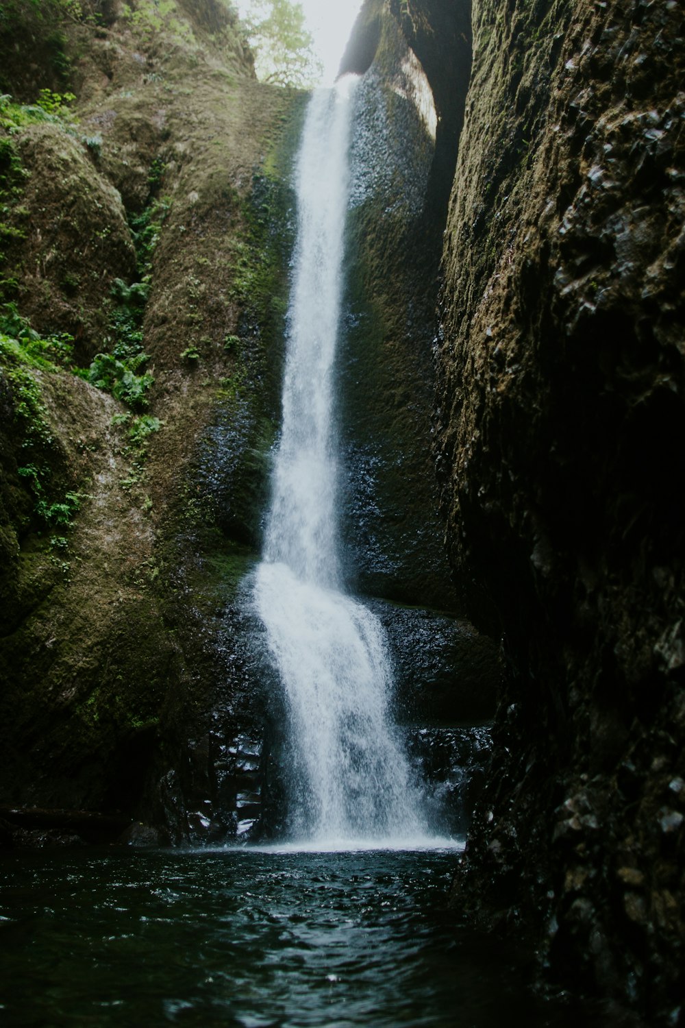 time lapse photography of waterfall