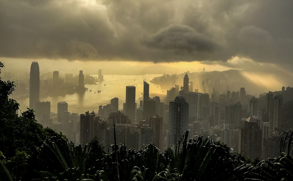 cityscape under cloudy sky at daytime