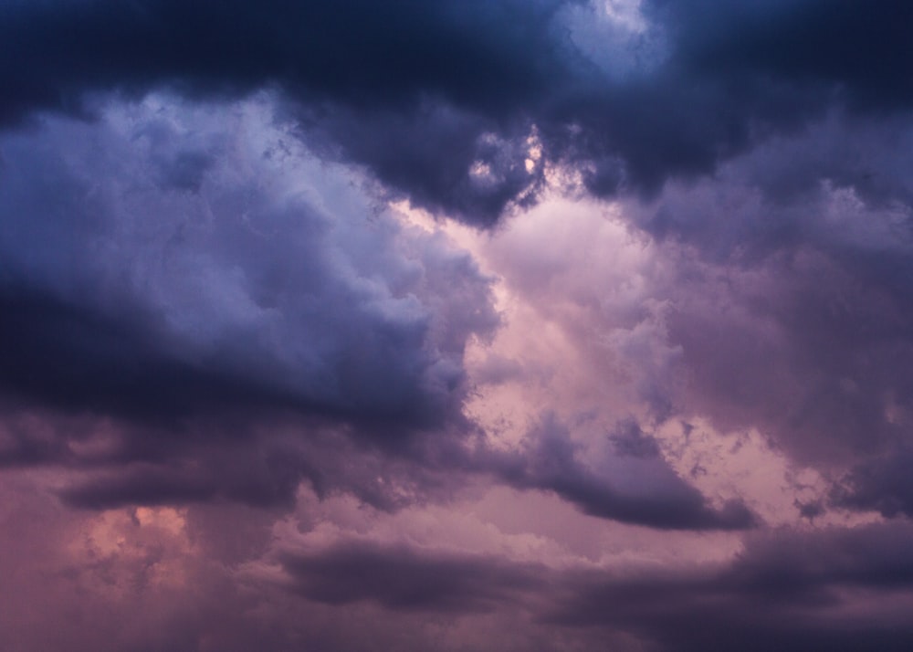 low angle of blue and pink cloudy sky