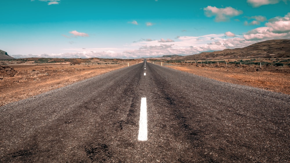 grey concrete road during daytime