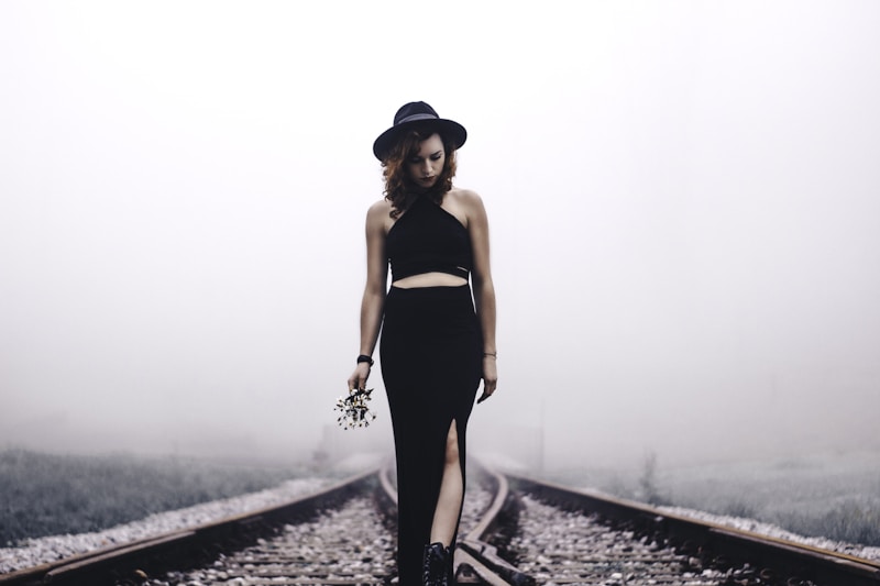 Romantic lady by train tracks
