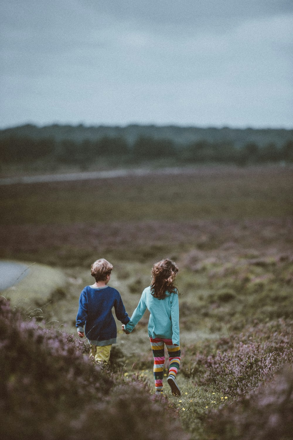 children waling downhill