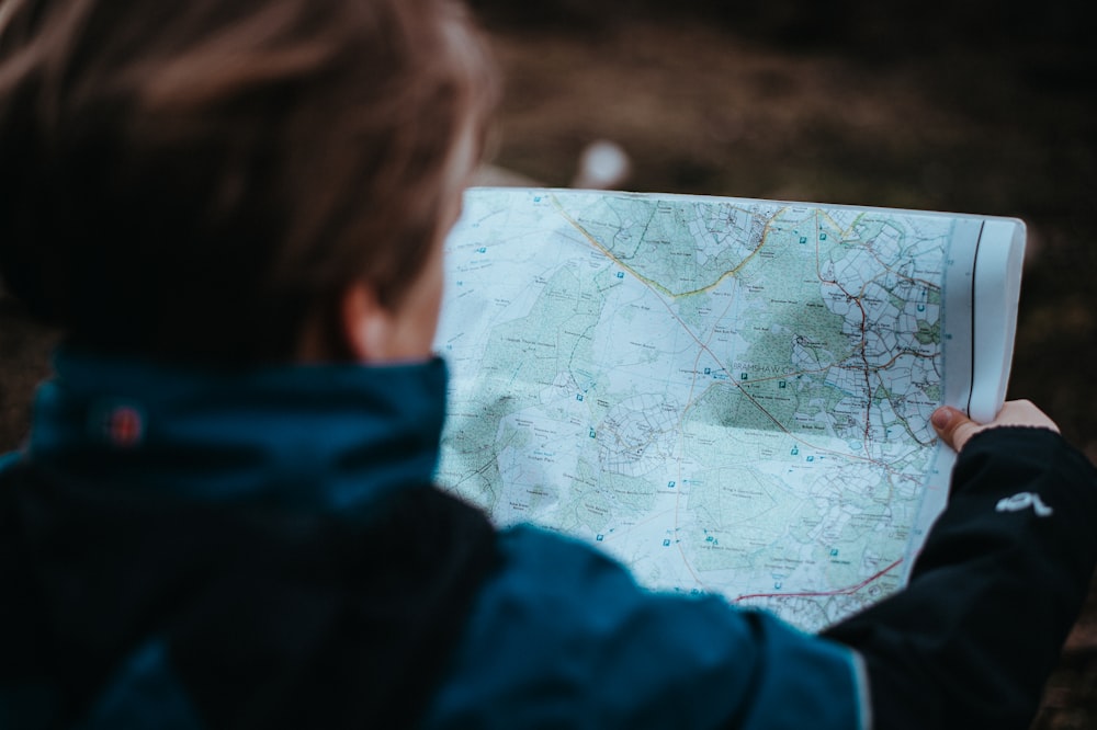 man looking at map