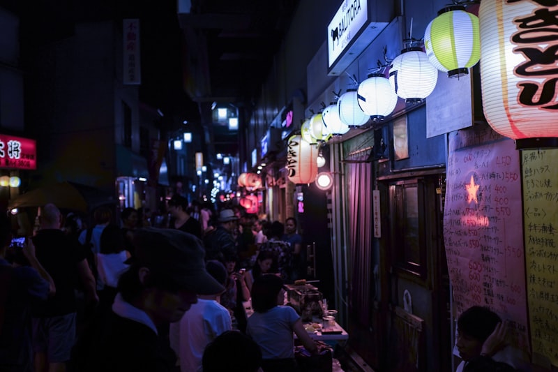 Tokyo neighborhood street with local shops and pedestrians