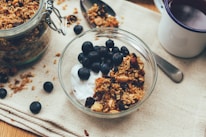 berry and nuts in clear glass bowl