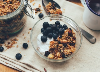 berry and nuts in clear glass bowl