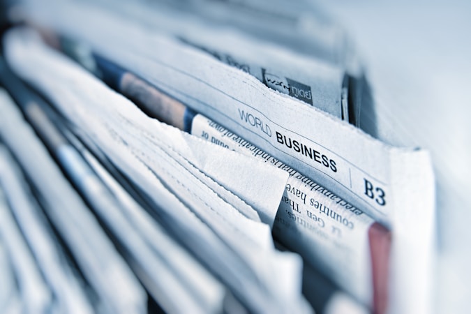 newspaper, paper, headline "world business"