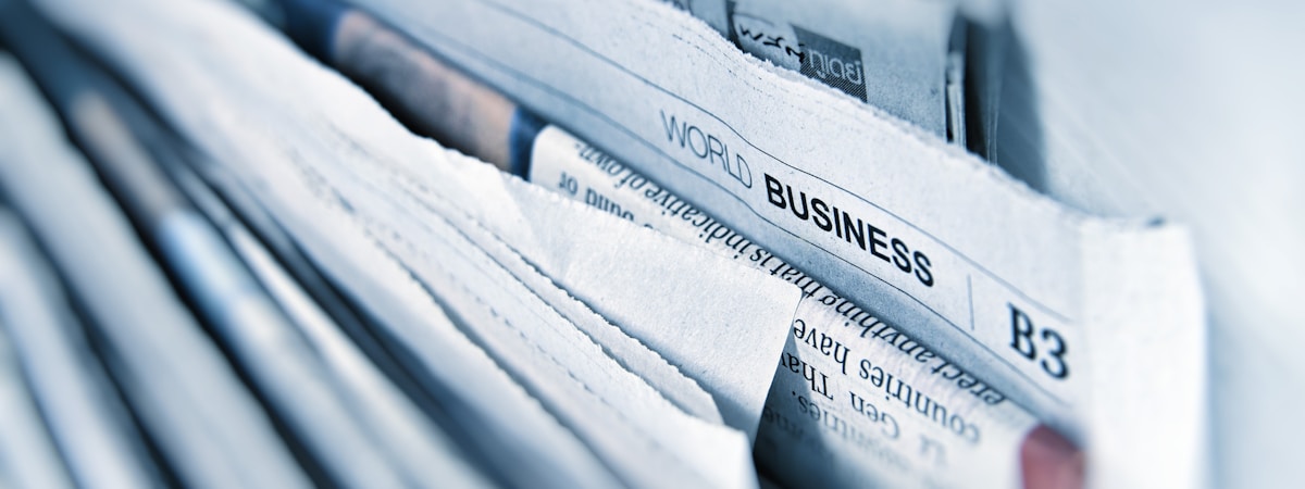 newspaper, paper, headline "world business"