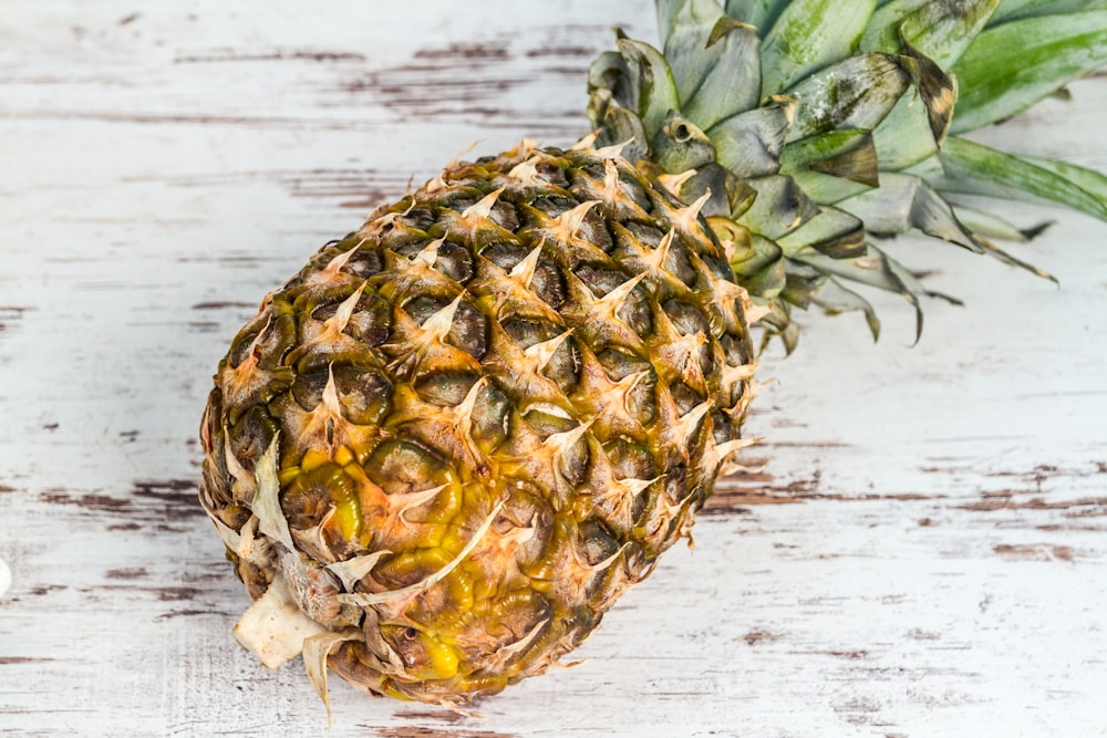 a close up of a pineapple on a table