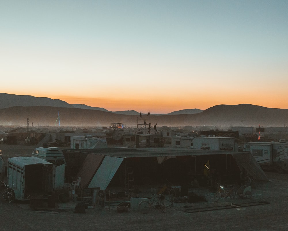 a group of tents in the middle of a desert