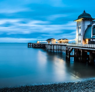 wooden structures near body of water