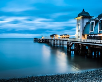 wooden structures near body of water