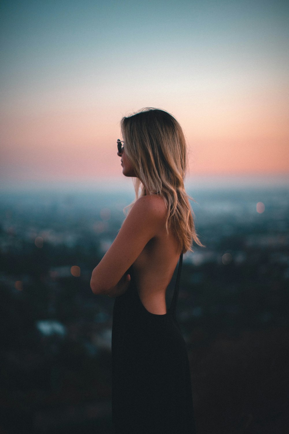 selective focus photography of woman facing left