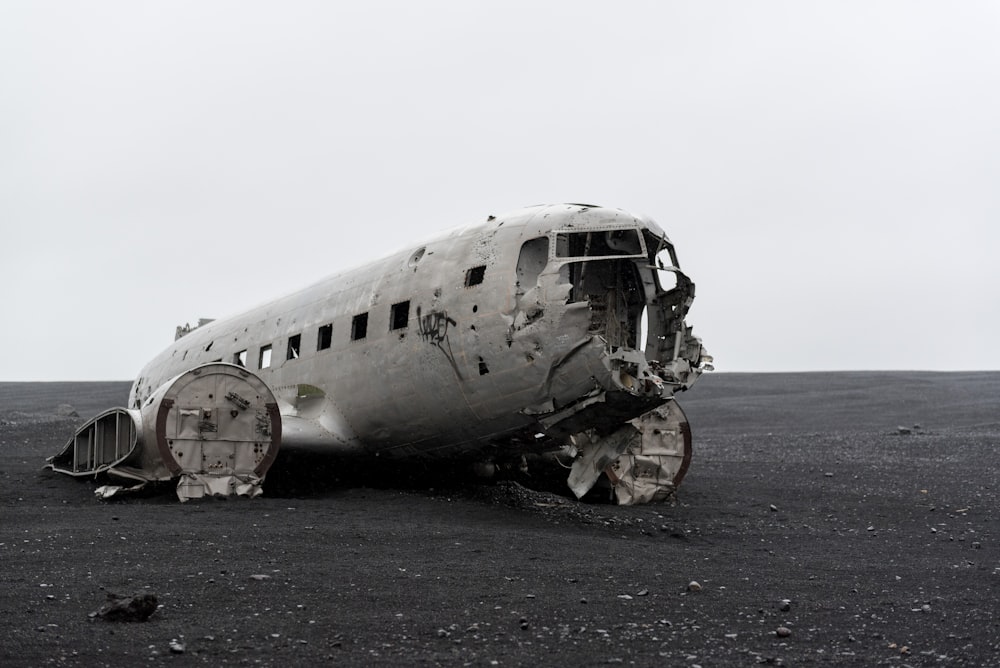 grayscale photography of wrecked airplane