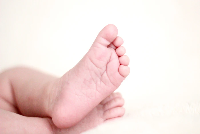 Newborn baby feet representing the baby zodiac predictor tool