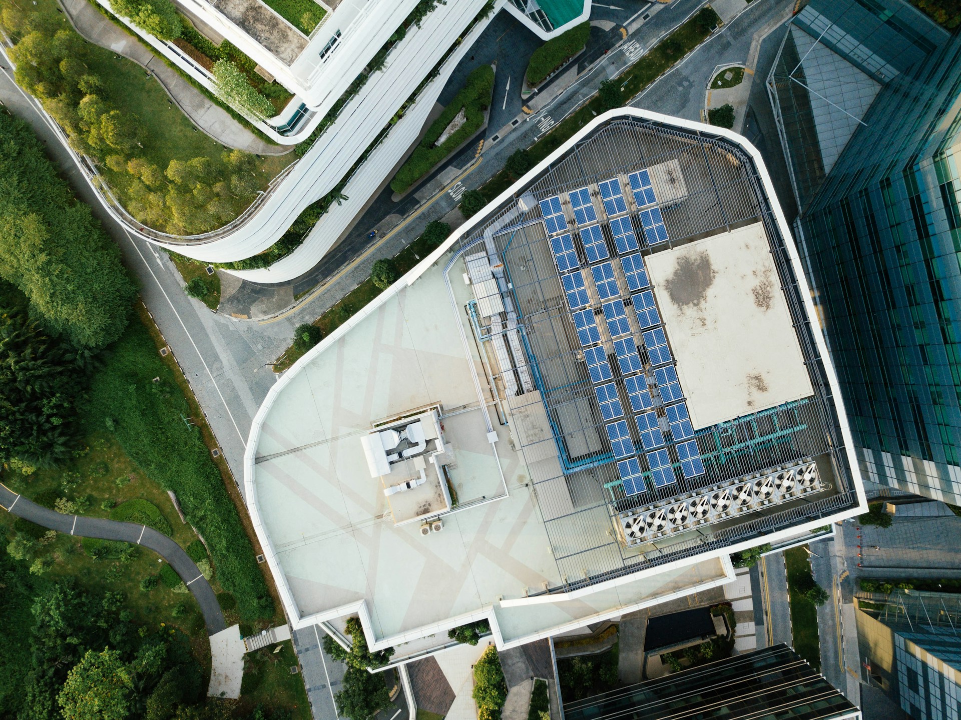 aerial photography of solar heater on building rooftop