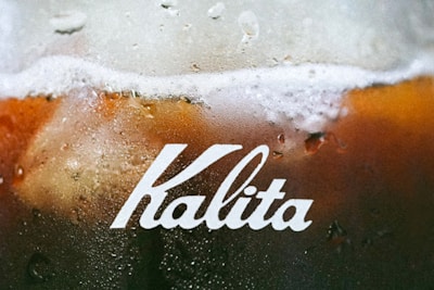 Close-up of a refreshing cup of Teh Manis Solo with condensation on the glass.