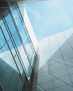 low angle photography of curtain wall building