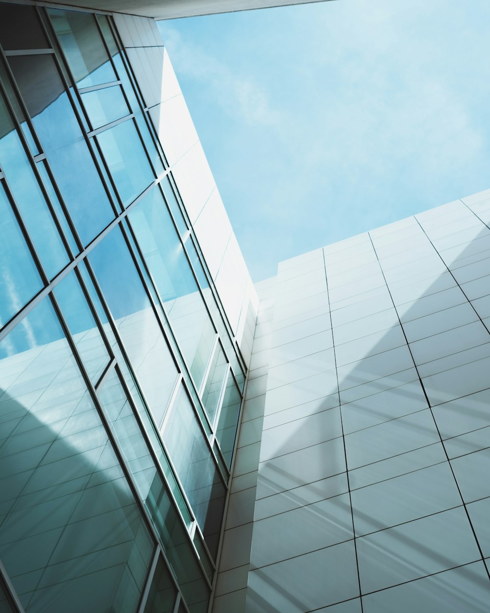 low angle photography of curtain wall building