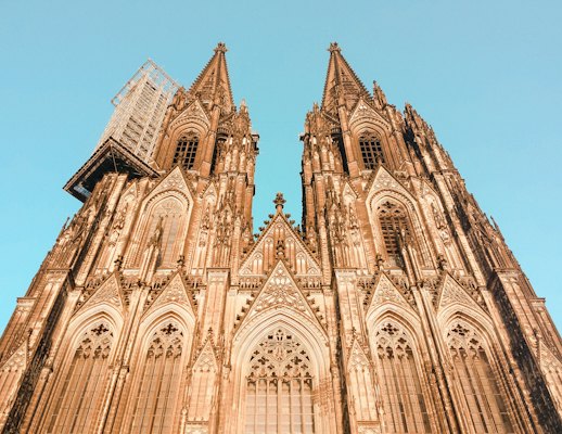 Cologne Cathedral from below, its two spires against the sky