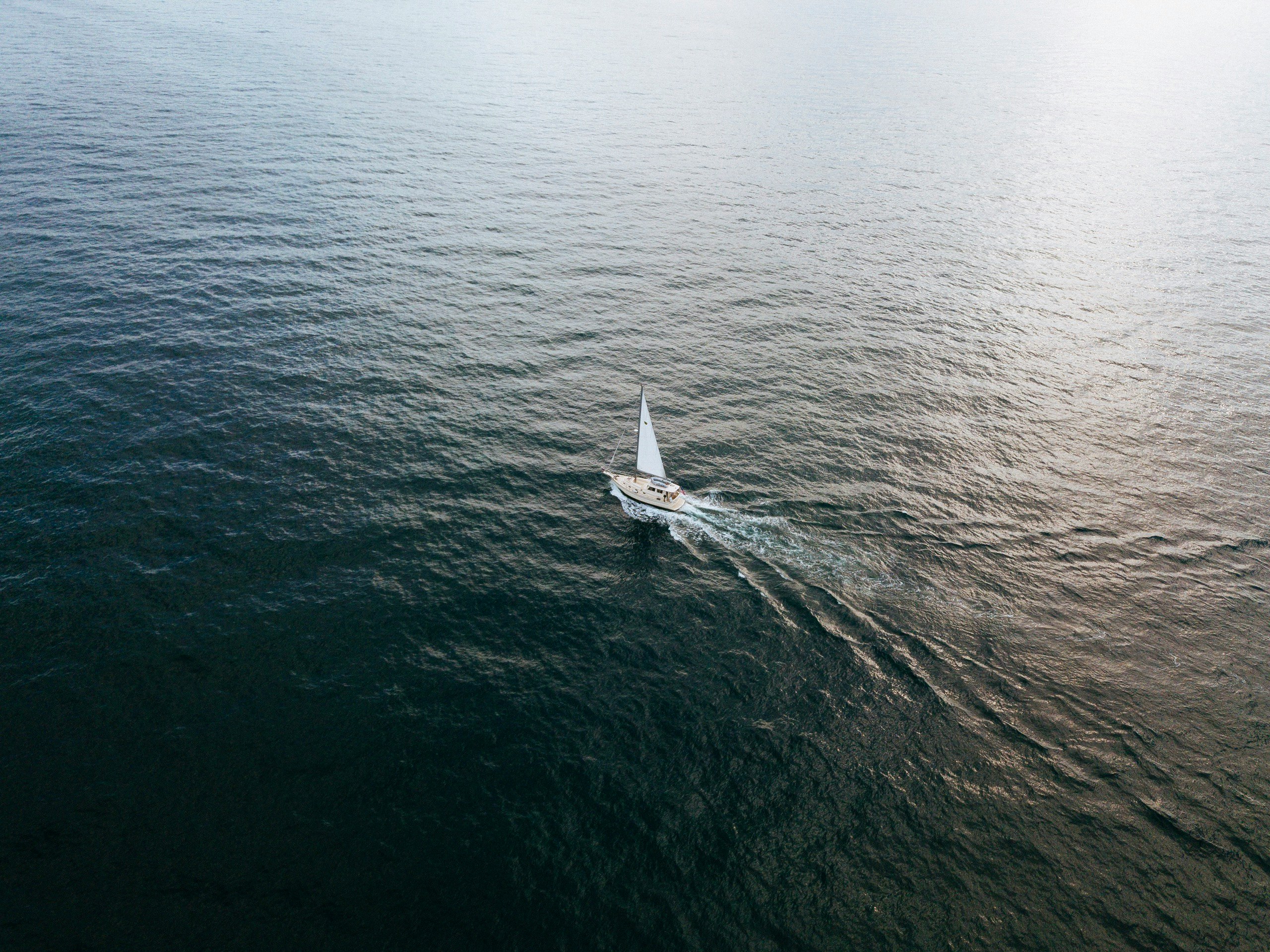 sailboat at the body of water