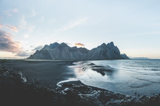 mountain terrain near body of water