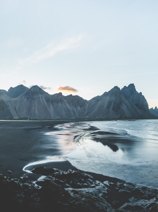 mountain terrain near body of water