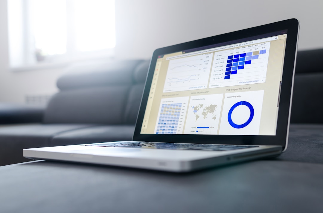 A computer displays a donut chart and several other data visualizations