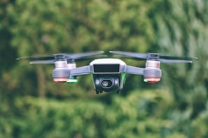 selective focus photography of gray drone