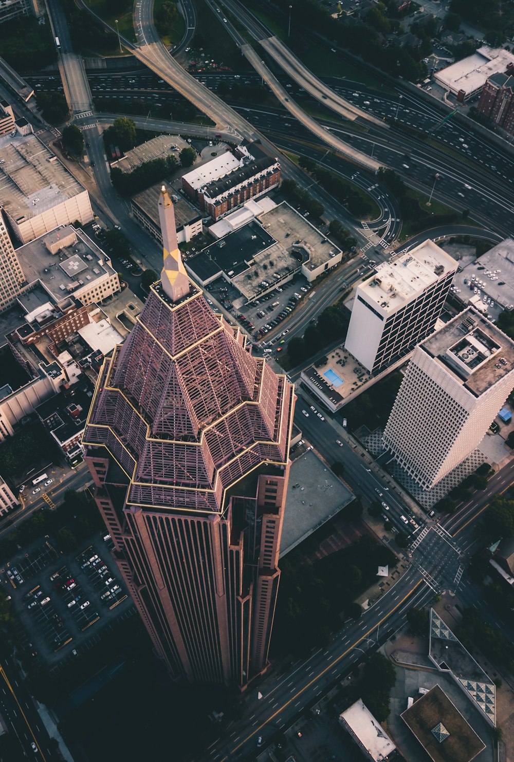 high-angle photography of high-rise building and concrete road