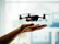 turned on black quadcopter drone