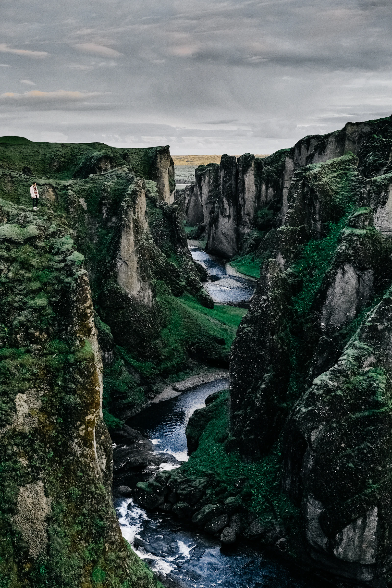 Icelandic landscape with waterfall and mountains