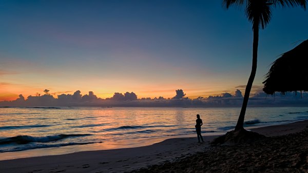 Silhouette of person standing near body of water — Punta Cana, Dominican Republic