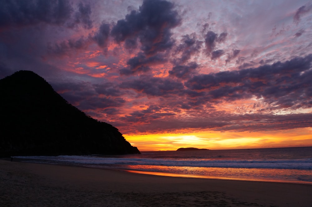 island and ocean during golden hour photography