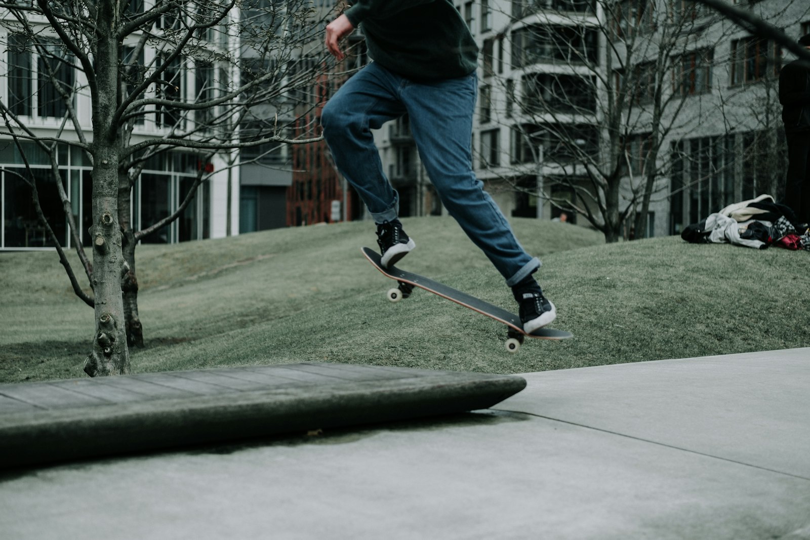 Fujifilm XF 50mm F2 R WR sample photo. Person doing ollie flip photography