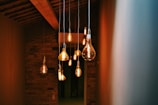 turned on orange pendant lamps