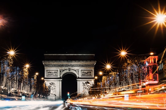 time lapse photo of highway in Arc de Triomphe France