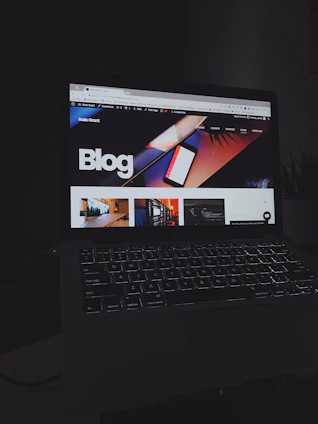 Close-up of a blog post on a sleek black and white website interface