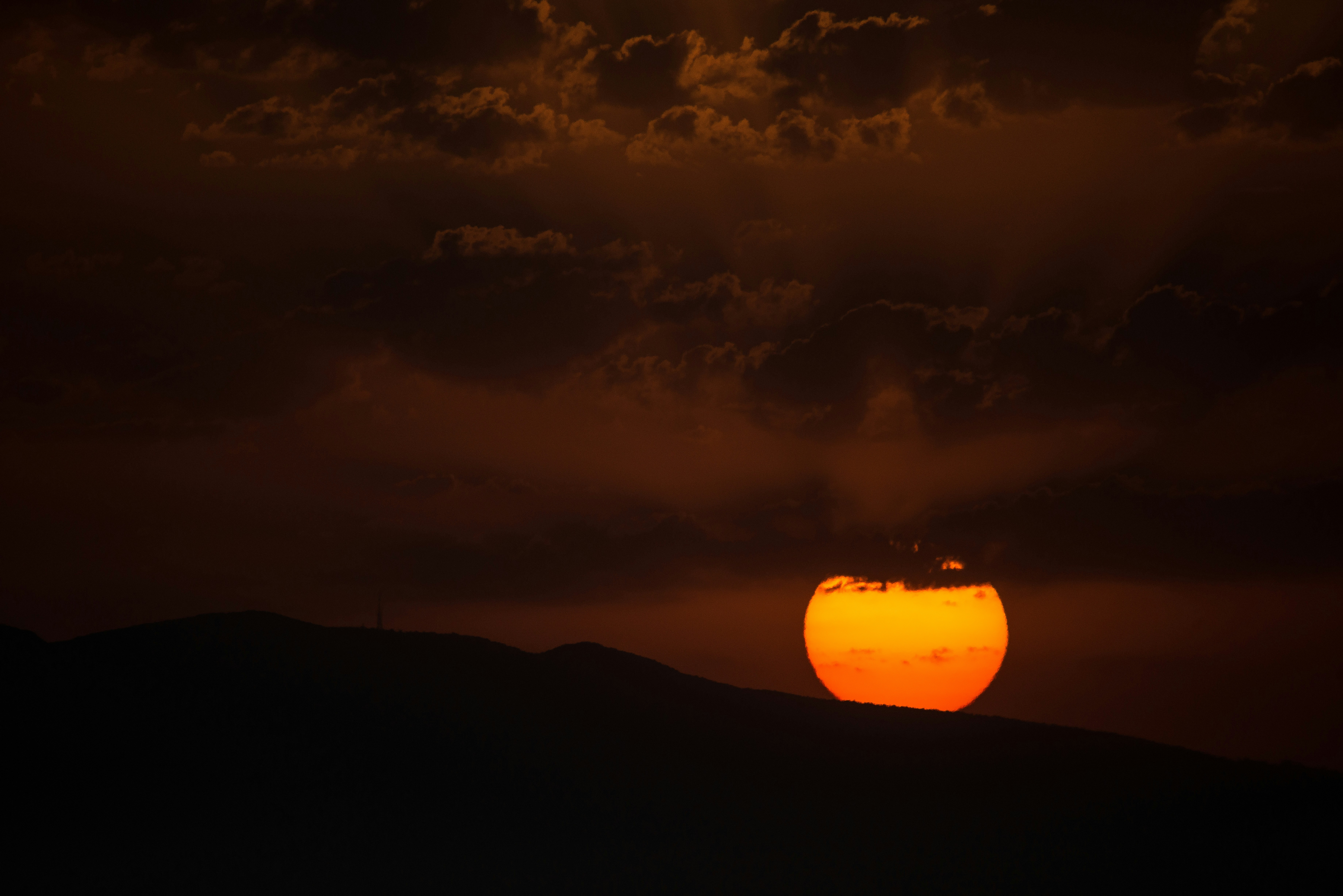 mountain with clouds during sunset view - Haifa