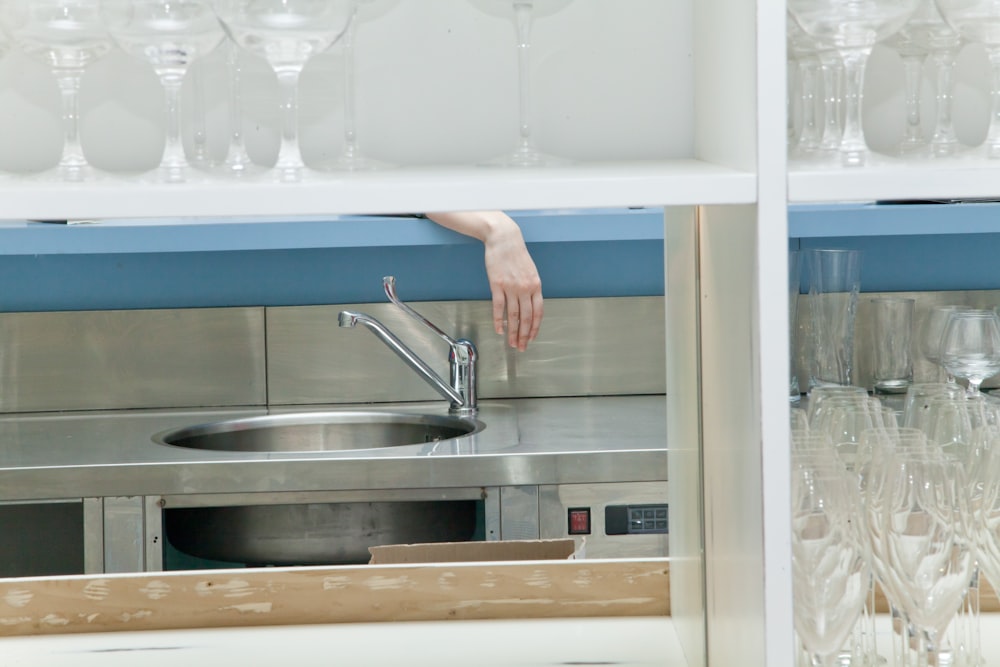 photo of gray metal sink