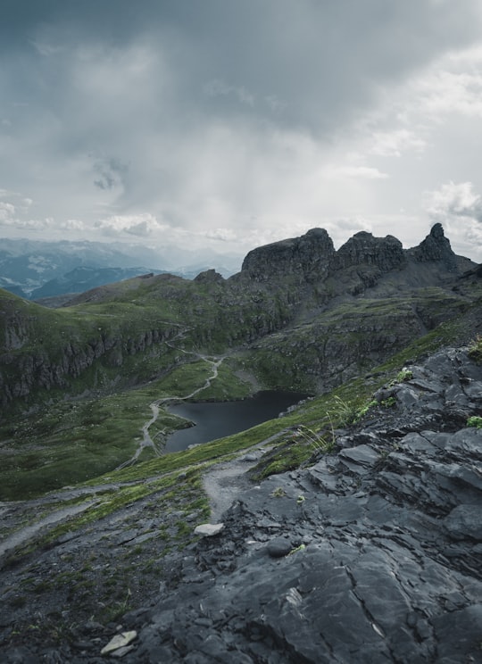 bird's-view photo of gray rock formations in Schwarzsee Switzerland