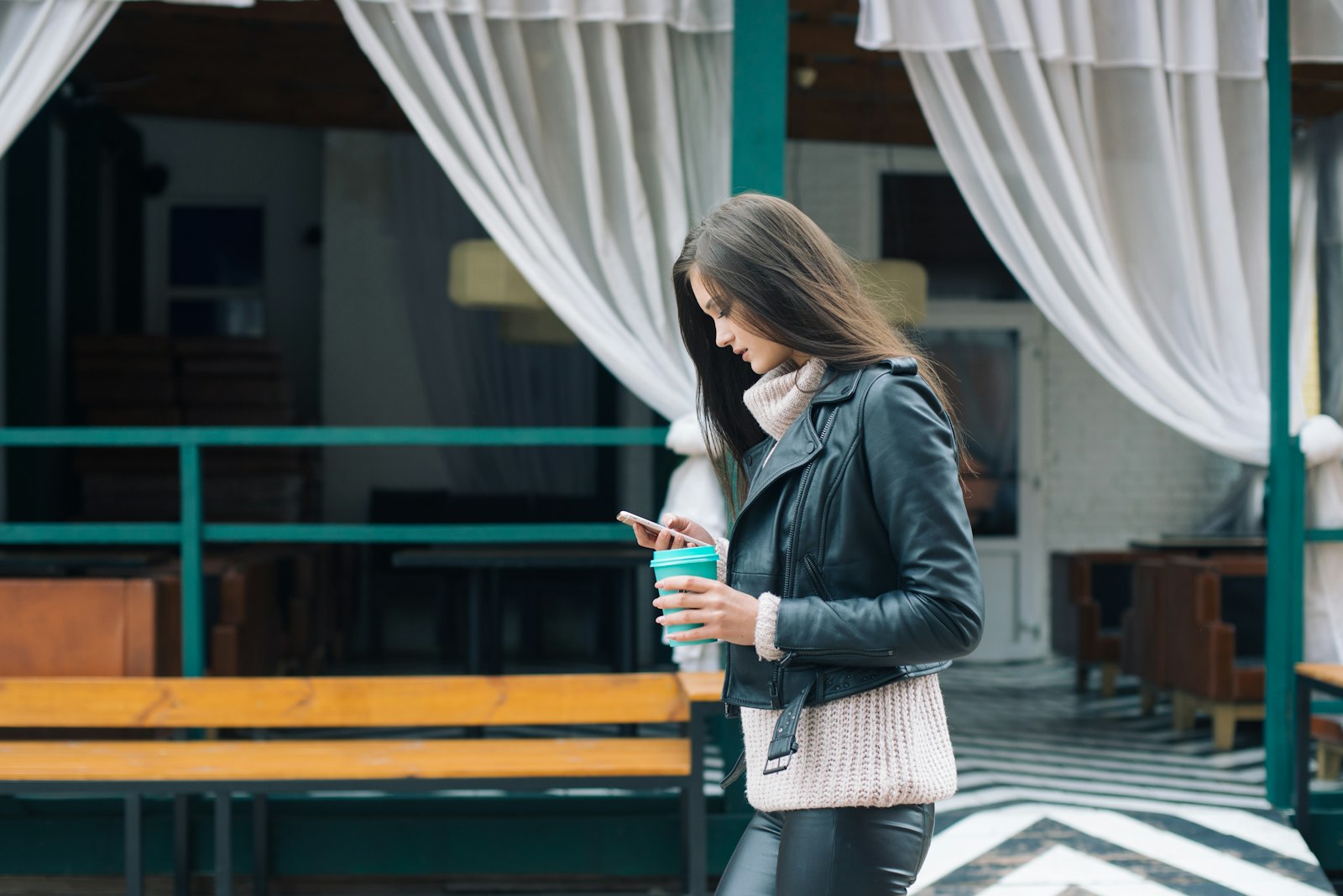 Nikon D600 + AF Nikkor 50mm f/1.4 sample photo. Woman using phone while photography