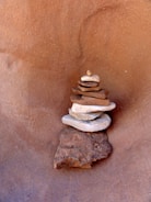 Stack of colorful sandstone tiles arranged by texture.