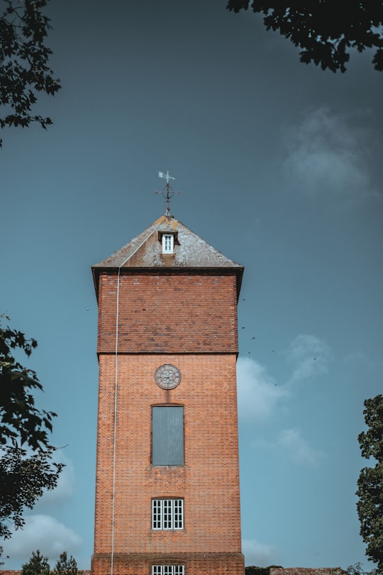 low-angle photo of brown concrete building in Exbury United Kingdom