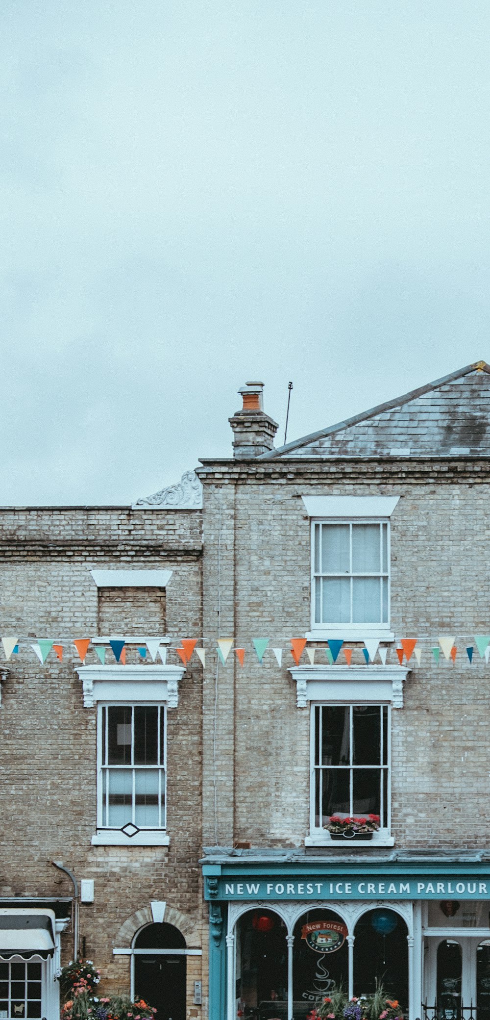 assorted-color buntings near building