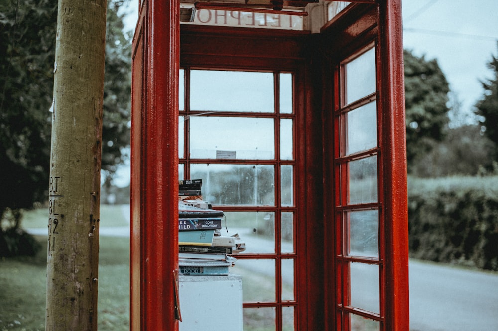 close up photography of red telephone booth