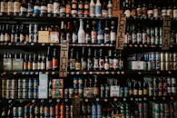 labeled glass bottles on shelf
