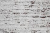 white and brown concrete brick wall